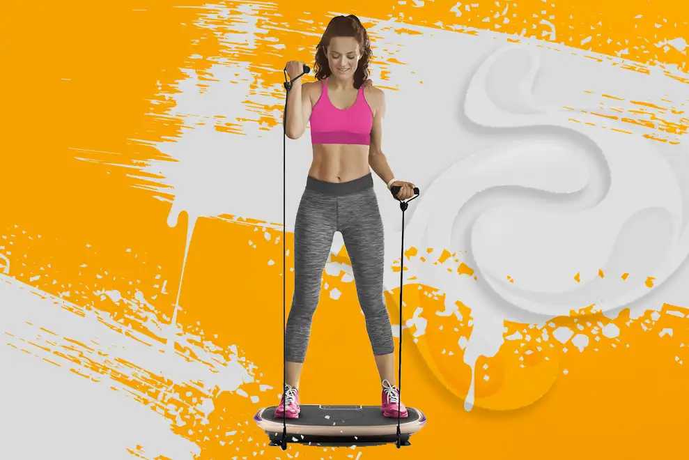 Zdjęcie przedstawiające kobietę ćwiczącą na platformie wibracyjnej
